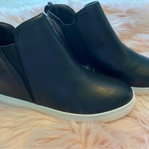 NWOT Slip on wedge booties.